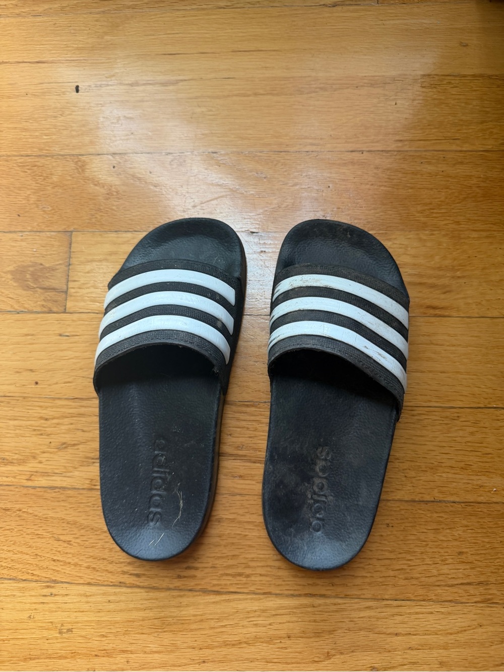Kids adidas Black Slides with White Stripes